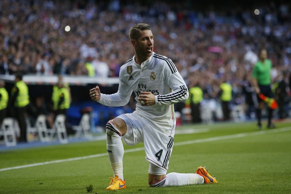 Real Madrid&#039;s Sergio Ramos celebrates his goal during a Spanish La Liga soccer match between Real Madrid and Malaga at the Santiago Bernabeu stadium in Madrid, Spain, Saturday, April 18, 2015. (A ...