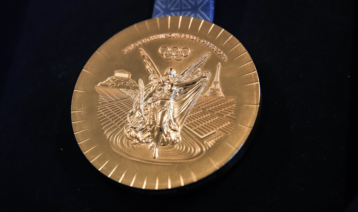 epa11135945 Back view of a gold medal of Paris 2024 Olympic Games displayed during a press presentation at the offices of Chaumet jewelry in Paris, France, 02 February 2024 (issued 08 February 2024).  ...