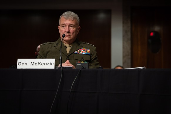 epa09493548 U.S. General Kenneth McKenzie prepares to testify in a Senate Armed Services Committee hearing on the conclusion of military operations in Afghanistan and plans for future counterterrorism ...