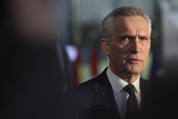 NATO Secretary General Jens Stoltenberg speaks as he arrives for a meeting of NATO defense ministers at NATO headquarters in Brussels, Tuesday, Feb. 14, 2023. (AP Photo/Olivier Matthys)