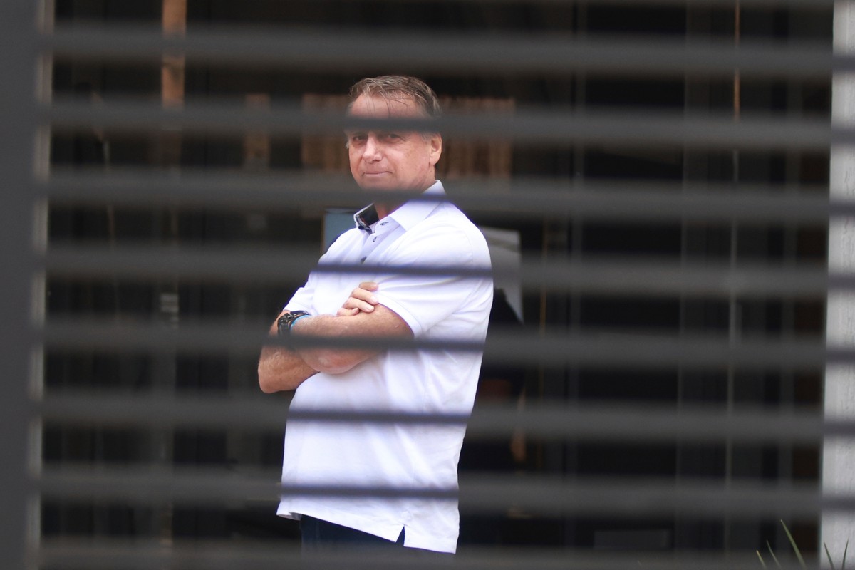 FILE - Brazil's former President Jair Bolsonaro stands at the entrance of his home where he is under house arrest in Brasilia, Brazil, Tuesday, Sept. 2, 2025. (AP Photo/Luis Nova, File)
Brazil Bo ...