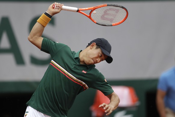 Japan&#039;s Kei Nishikori breaks his racket in his third round match of the French Open tennis tournament against Korea&#039;s Hyeon Chung at the Roland Garros stadium, in Paris, France. Saturday, Ju ...