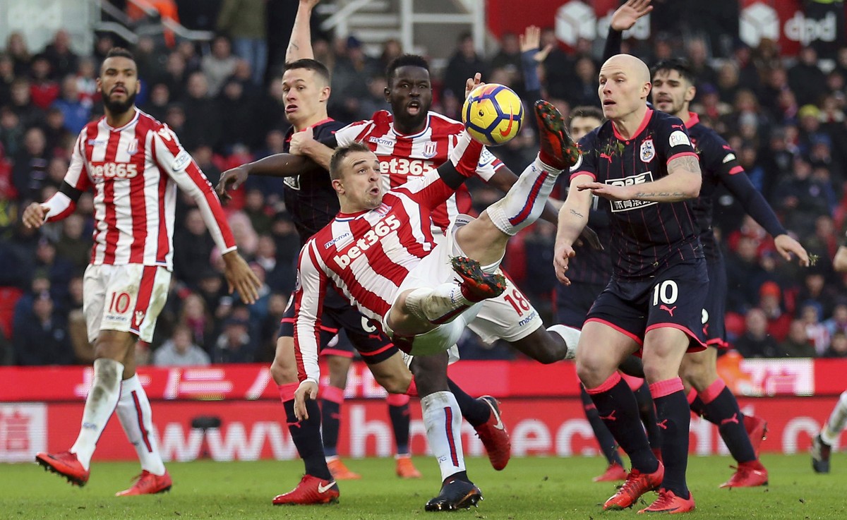Stoke City's Xherdan Shaqiri has a shot and scores but has his goal against Huddersfield Town is disallowed during their English Premier League soccer match at the bet365 Stadium in Stoke, Englan ...