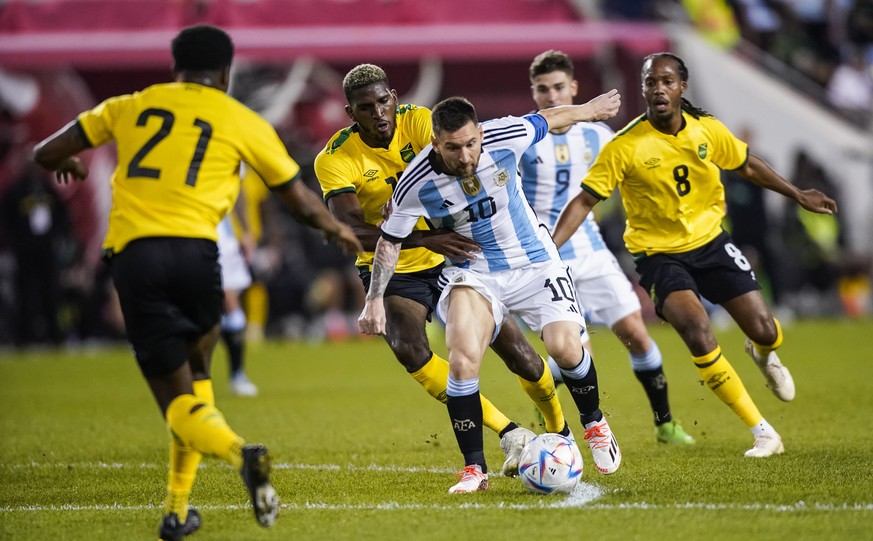 Argentina&#039;s forward Lionel Messi (10) fights for the ball against Jamaica&#039;s forward Shamar Nicholson during the second half of an international friendly soccer match on Tuesday, Sept. 27, 20 ...