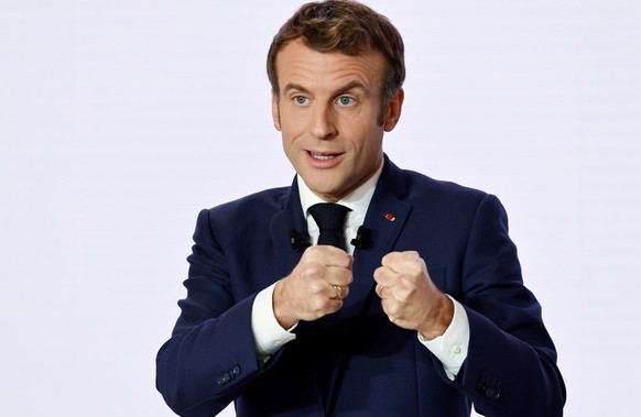 FILE - French President Emmanuel Macron gestures as he delivers a speech during a press conference on France assuming EU presidency, Thursday, Dec. 9, 2021 in Paris. President Emmanuel Macron has prov ...