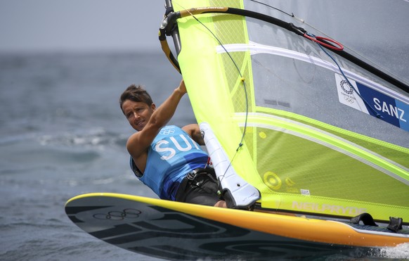 epa09373074 Mateo Sanz Lanz of Switzerland competes in the Men&#039;s RS:X windsurf during the Sailing events of the Tokyo 2020 Olympic Games in Enoshima, Japan, 28 July 2021. EPA/OLIVIER HOSLET