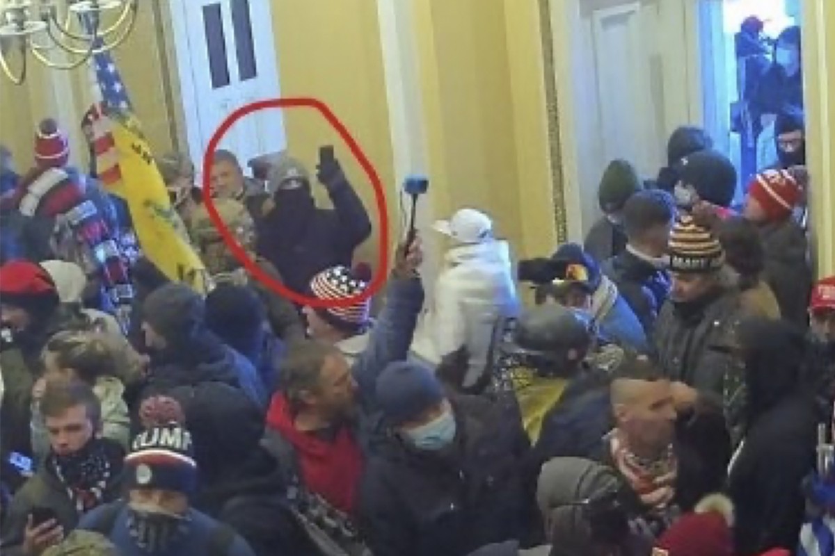 This image provided by District of Columbia Attorney's Office obtained from the U.S. Capitol Police shows Matthew Huttle inside the Capitol building on Jan. 6, 2021 in Washington. (Attorney' ...