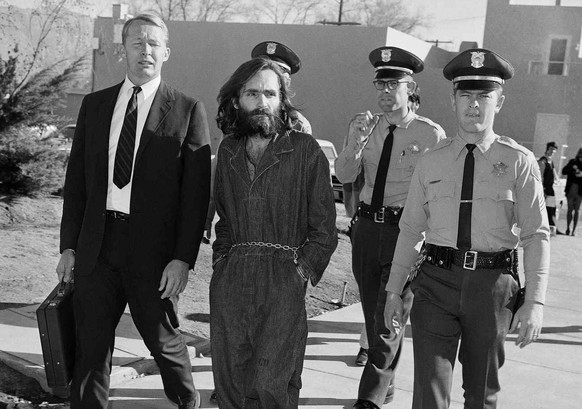 Charles Manson is pictured en route to a Los Angeles courtroom on in this Dec. 17, 1970 photo. California corrections officials released a new photograph of convicted mass murderer Charles Manson, Wed ...