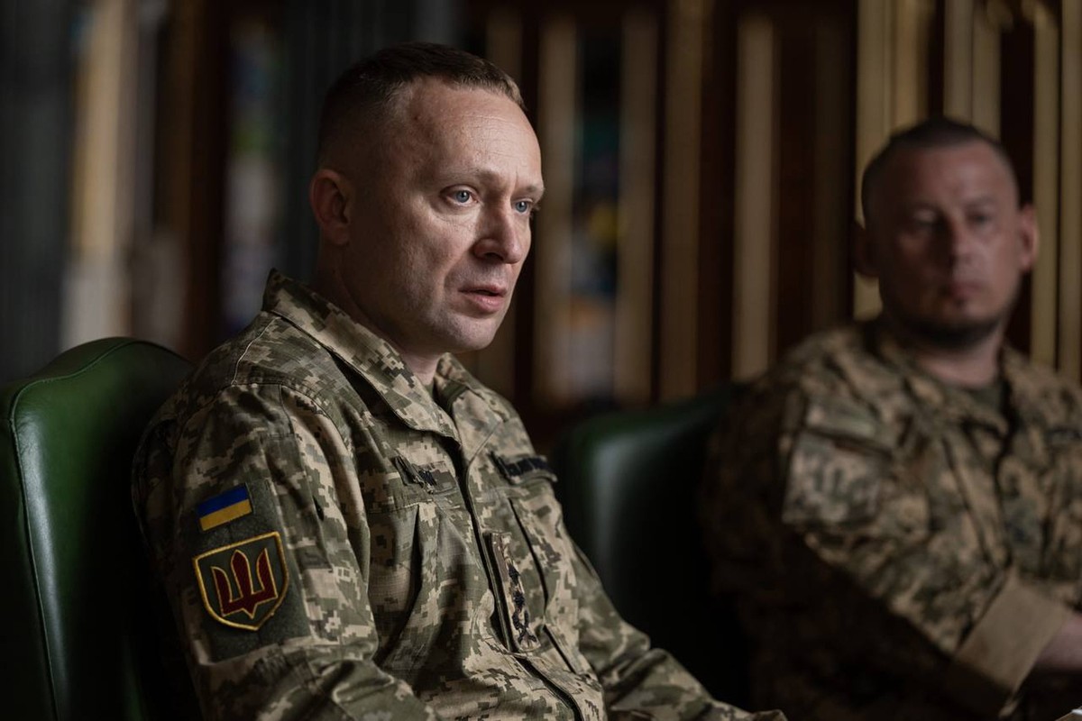 In this photo provided by the Ukrainian Presidential Press Office, new commander-in-chief of Ukraine's Armed Forces Mykhailo Drapatyi looks on during his meeting with Ukrainian President Volodymy ...