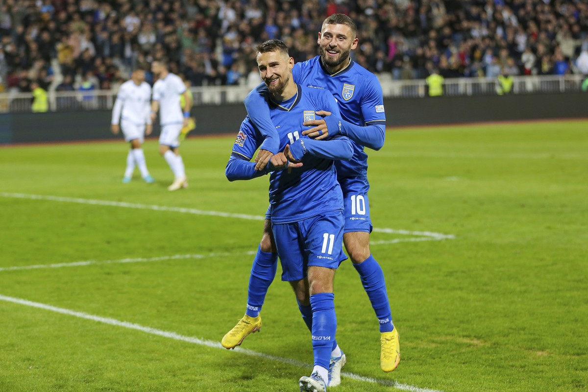 Kosovo's Elbasan Rashani and Kosovo's Arber Zeneli celebrate after scoring the third goal during the UEFA Nations League soccer match between Kosovo and Cyprus at Fadil Vokrri stadium in Pri ...