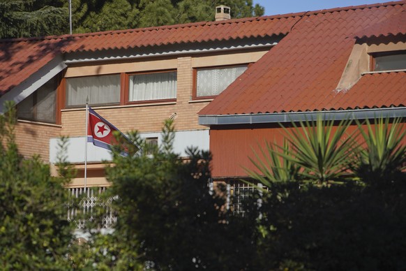 The flag of North Korea waves inside the compound of the North Korean embassy in Rome, Thursday, Jan. 3, 2018. North Korea&#039;s acting ambassador to Italy, Jo Song Gil, went into hiding with his wif ...