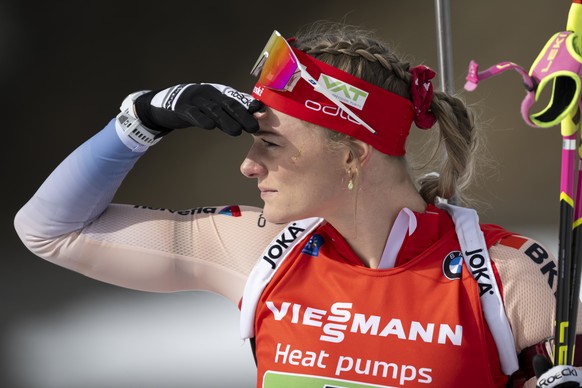Amy Baserga of Switzerland reacts during the women?s relay race at the IBU Biathlon World Championships, on Saturday, February 22, 2025, in Lenzerheide, Switzerland. (KEYSTONE/Gian Ehrenzeller)