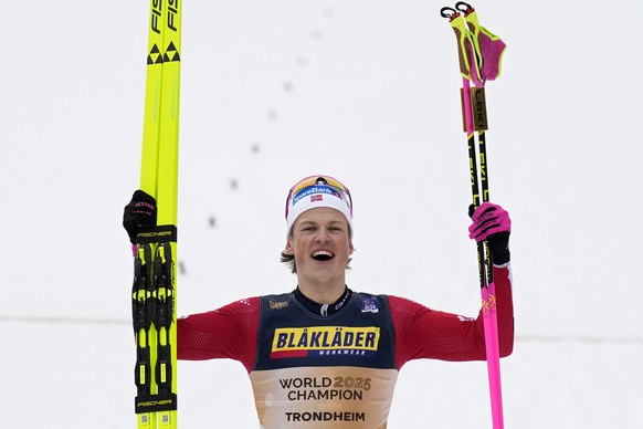 Johannes Hoesflot Klaebo, of Norway, celebrates after winning the men&#039;s cross-country skiathlon 20 Km at the Nordic World Ski Championships in Trondheim, Norway, Saturday, March 1, 2025. (AP Phot ...