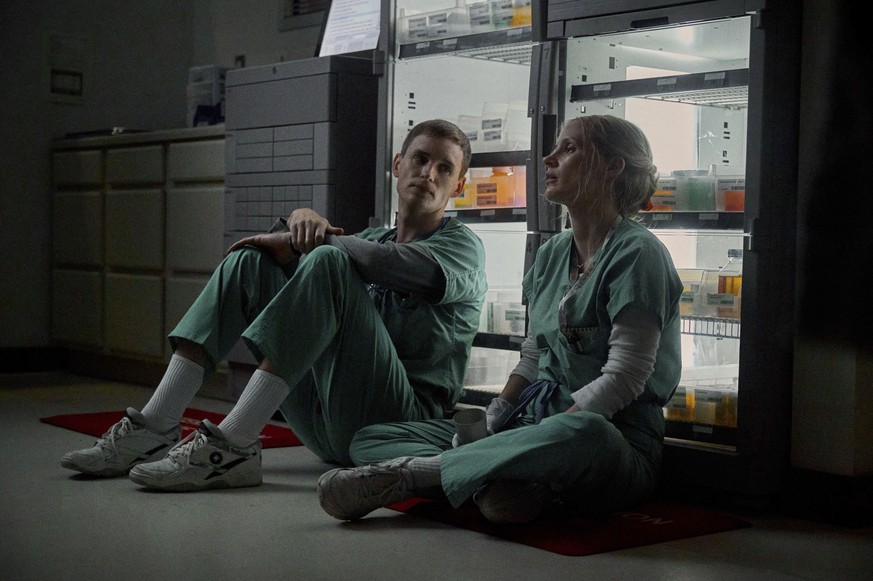 This image released by Netflix shows Eddie Redmayne and Jessica Chastain in a scene from &quot;The Good Nurse.&quot; (JoJo Whilden/Netflix via AP)