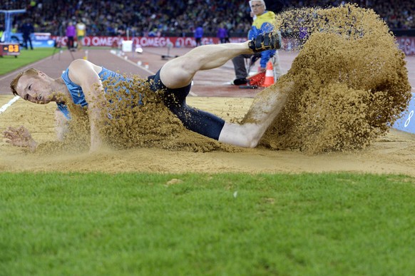 epa04911472 Greg Rutherford from Britain competes in the men&#039;s Long Jump event during the Weltklasse IAAF Diamond League international athletics meeting at the Letzigrund stadium in Zurich, Switz ...