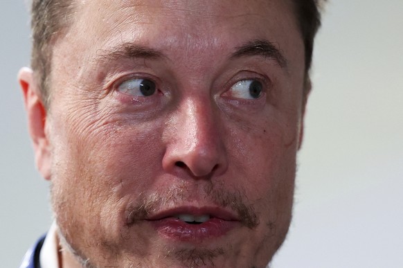 Tesla and SpaceX&#039;s CEO Elon Musk attends the AI Safety Summit at Bletchley Park, on Wednesday, Nov. 1, 2023 in Bletchley, England. Digital officials, tech company bosses and researchers are conve ...