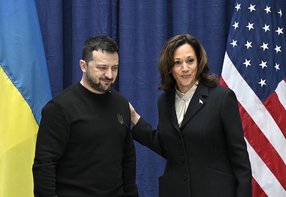 FILE - Ukrainian President Volodymyr Zelenskyy, left, and U.S. Vice President Kamala Harris pose for pictures at the end of a news conference at the Munich Security Conference in Munich, Germany, on F ...