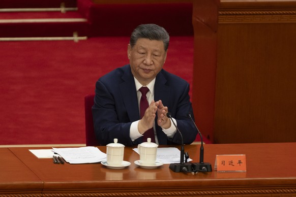 epa13077682 Chinese President and Secretary General of the Communist Party of China, Xi Jinping applauds during the celebration of the 105th founding anniversary of the Chinese Communist Party, in Bei ...