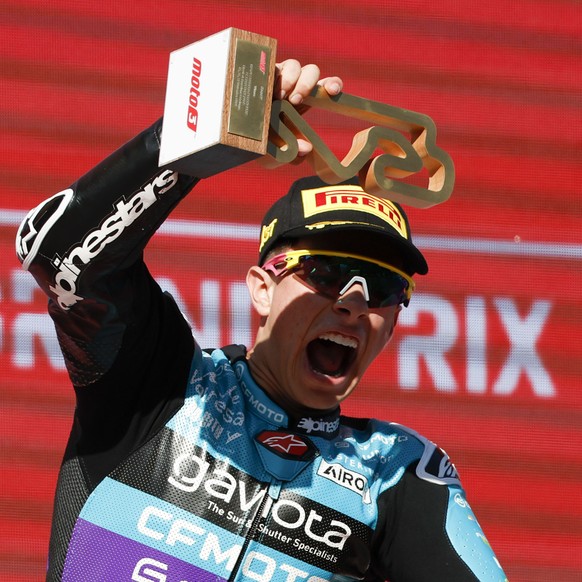 Colombian David Alonso of the CFMOTO Aspar Team celebrates with trophy on the podium after winning the Moto3 race of the Grand Prix of Barcelona at the Catalunya racetrack in Montmelo, just outside of ...