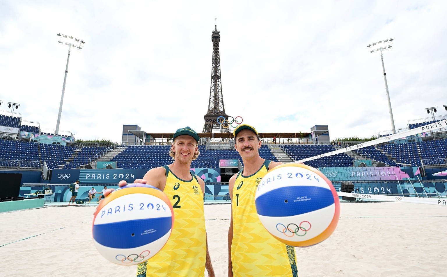 OLY24 AUSTRALIAN Beach volleyball, Beachvolleyball Australian Mens beach volleyball athletes Thomas Hodges left and Zachery Schubert pose for photographs at Eiffel Tower Stadium in Paris, ahead of the ...