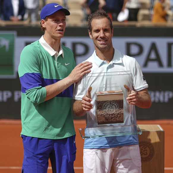 Italy&#039;s Jannik Sinner, left, stands by France&#039;s Richard Gasquet after their second round match of the French Tennis Open, at the Roland-Garros stadium, in Paris, Thursday, May 29, 2025. (AP  ...