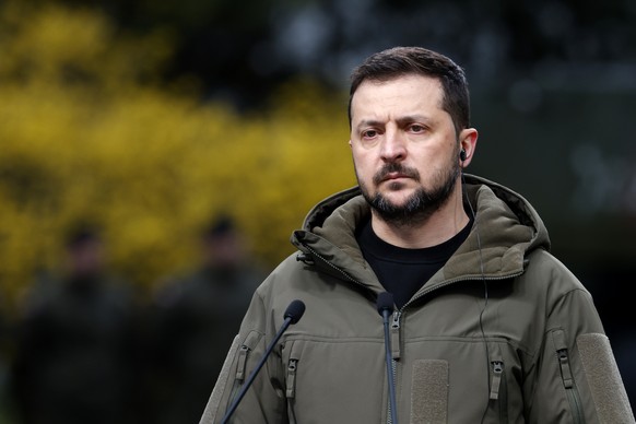 Ukrainian President Volodymyr Zelenskyy attends a press conference with Poland&#039;s Prime Minister Mateusz Morawiecki as they meet in Warsaw, Poland, Wednesday, April 5, 2023. (AP Photo/Michal Dyjuk ...