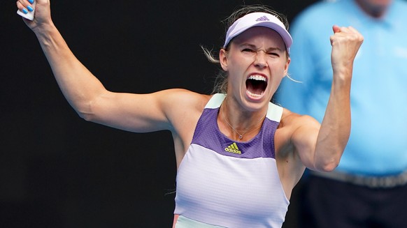 epa08149416 Caroline Wozniacki of Denmark in action against Dayana Yastremska of Ukraine during their second round match at the Australian Open tennis tournament at Melbourne Park in Melbourne, Austra ...