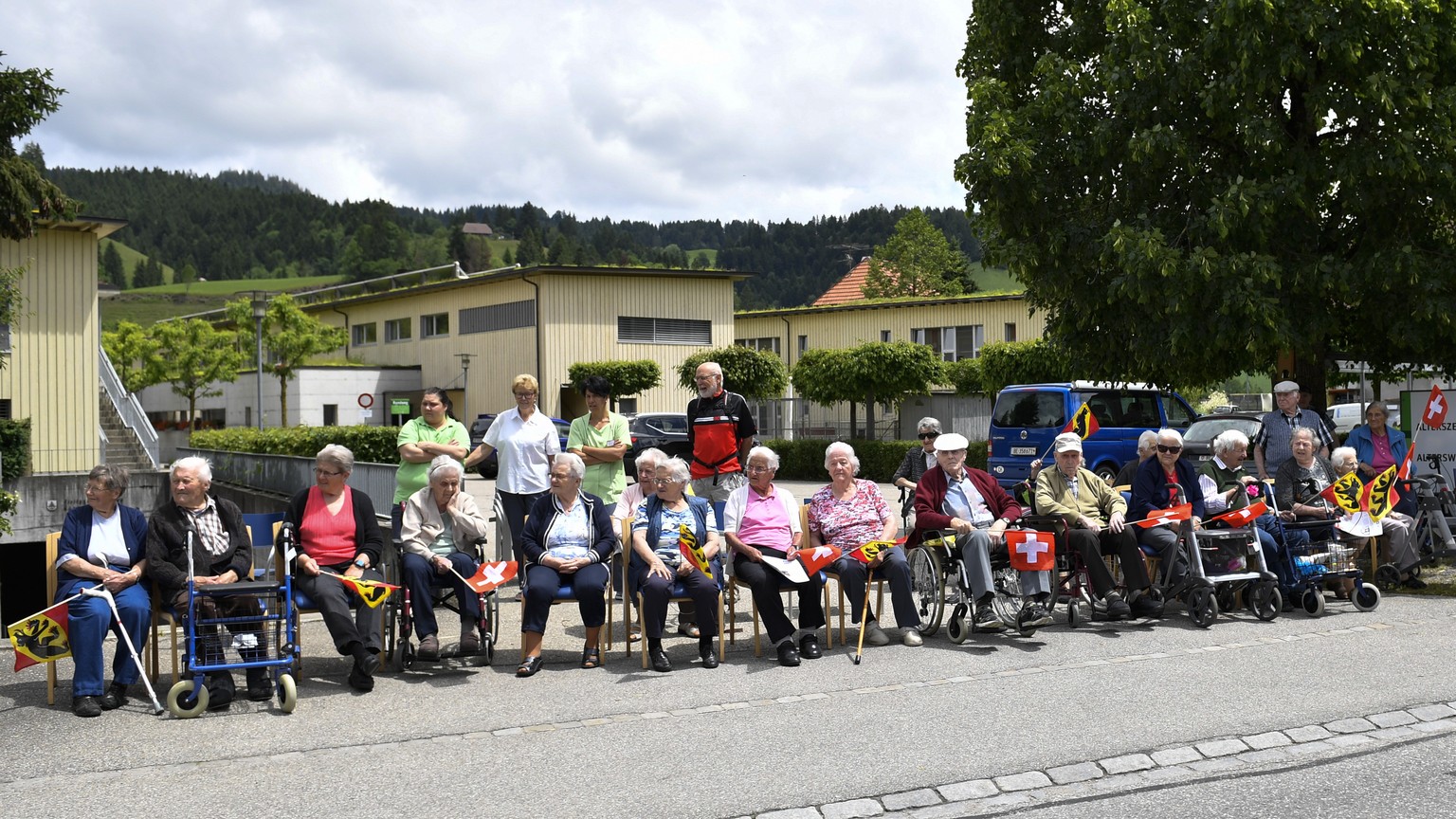 Spectators await the arrival of the peloton during the second stage, a 159.9 km circuit race with start and finish in Langnau im Emmental, Switzerland, at the 83rd Tour de Suisse UCI ProTour cycling r ...