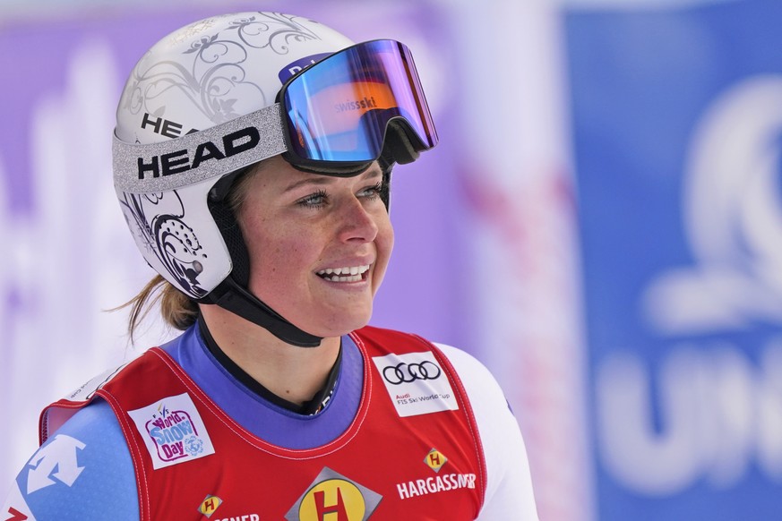 Switzerland&#039;s Corinne Suter reacts as she crosses the finish line of an alpine ski, women&#039;s World Cup downhill, in Altenmarkt-Zauchensee, Austria, Saturday, Jan. 11, 2020. (AP Photo/Giovanni ...