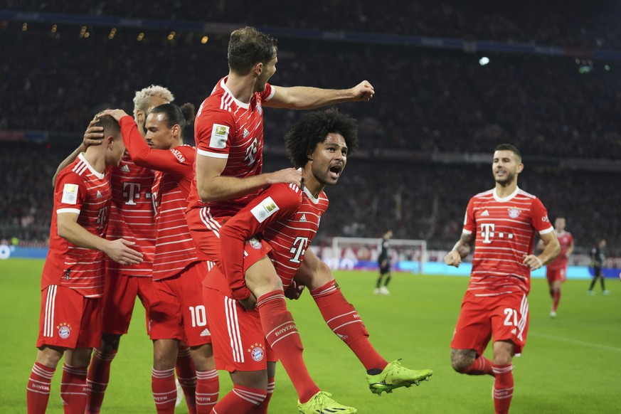 Bayern&#039;s Leon Goretzka, centre top, and Serge Gnabry, centre, celebrate with teammates after scoring their side&#039;s third goal during the Bundesliga soccer match between Bayern Munich and Werd ...