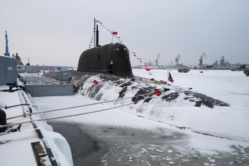 epa11023077 Newly built Russian nuclear submarine Krasnoyarsk during a naval flag-raising ceremony at the Chevmash shipyard, a subsidiary of the United Shipbuilding Corporation in Sever ...