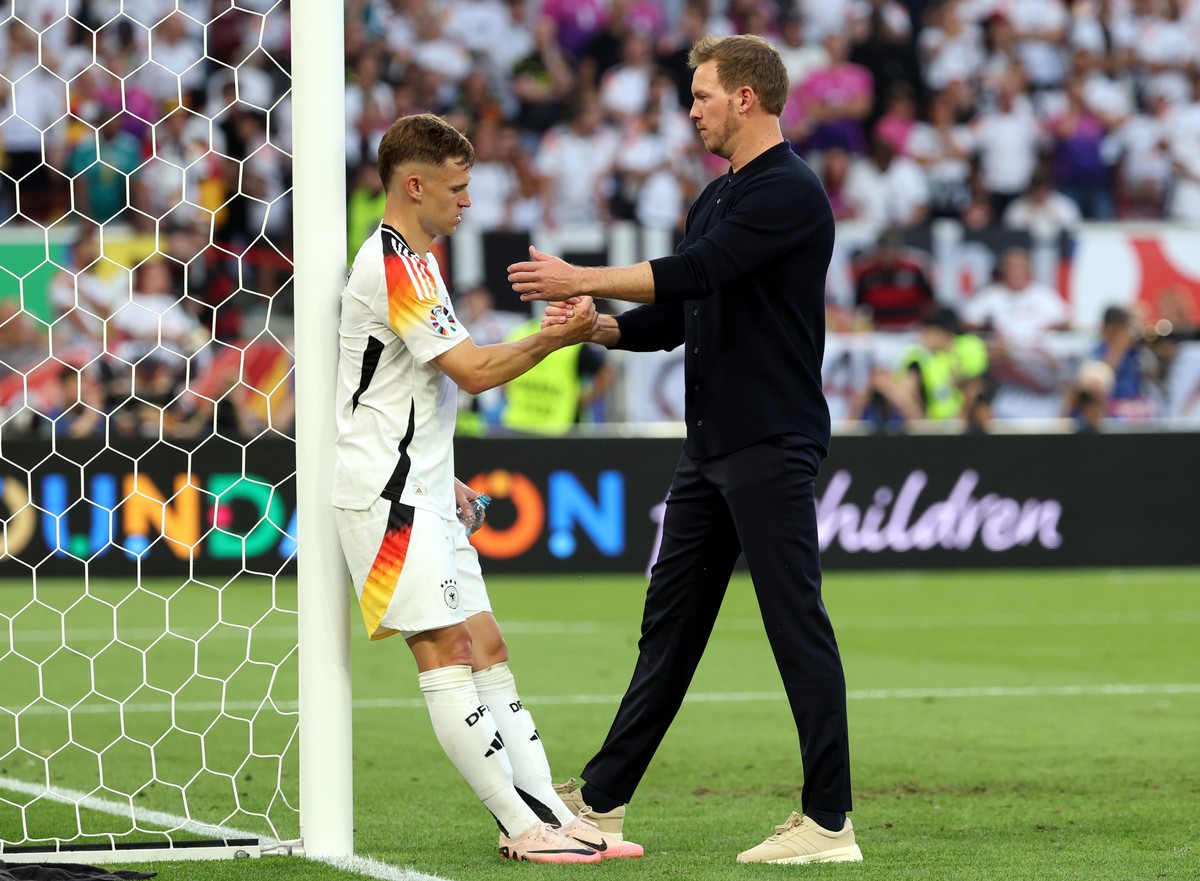 epa11460454 Head coach Julian Nagelsmann of Germany (R) reacts with player Joshua Kimmich after the UEFA EURO 2024 quarter-finals soccer match between Spain and Germany, in Stuttgart, Germany, 05 July ...