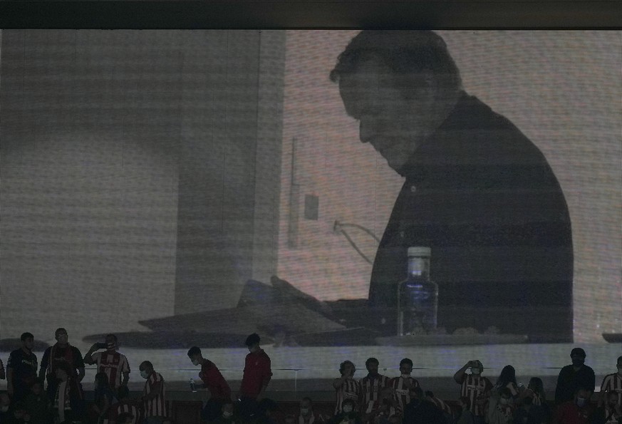 An image of Barcelona&#039;s head coach Ronald Koeman appears on a screen after the La Liga soccer match between Atletico Madrid and Barcelona at the Estadio Wanda Metropolitano in Madrid, Saturday, O ...