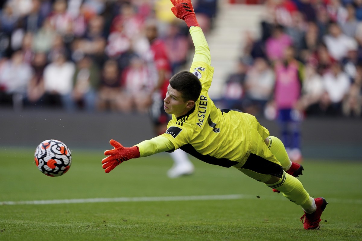 Leeds United's goalkeeper Illan Meslier dives to make a save during an English Premier League soccer match against Southampton at St. Mary's Stadium in Southampton, England, Saturday, Oct. 1 ...