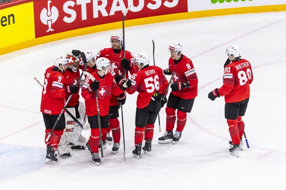 Switzerland&#039;s players celebrate their victory after defeating the team Denmark, during the IIHF 2025 World Championship semifinal game between Switzerland and Denmark, at the Avicii Arena (Globe) ...