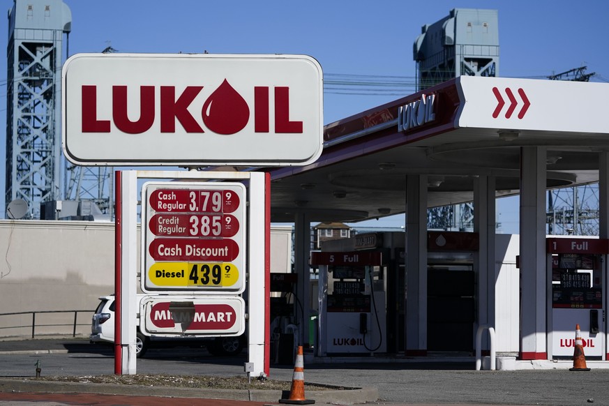 A Lukoil gas station sits in Newark, N.J., Thursday, March 3, 2022. Outraged by the invasion of Ukraine, the Newark City Council voted unanimously Wednesday to suspend the service stations