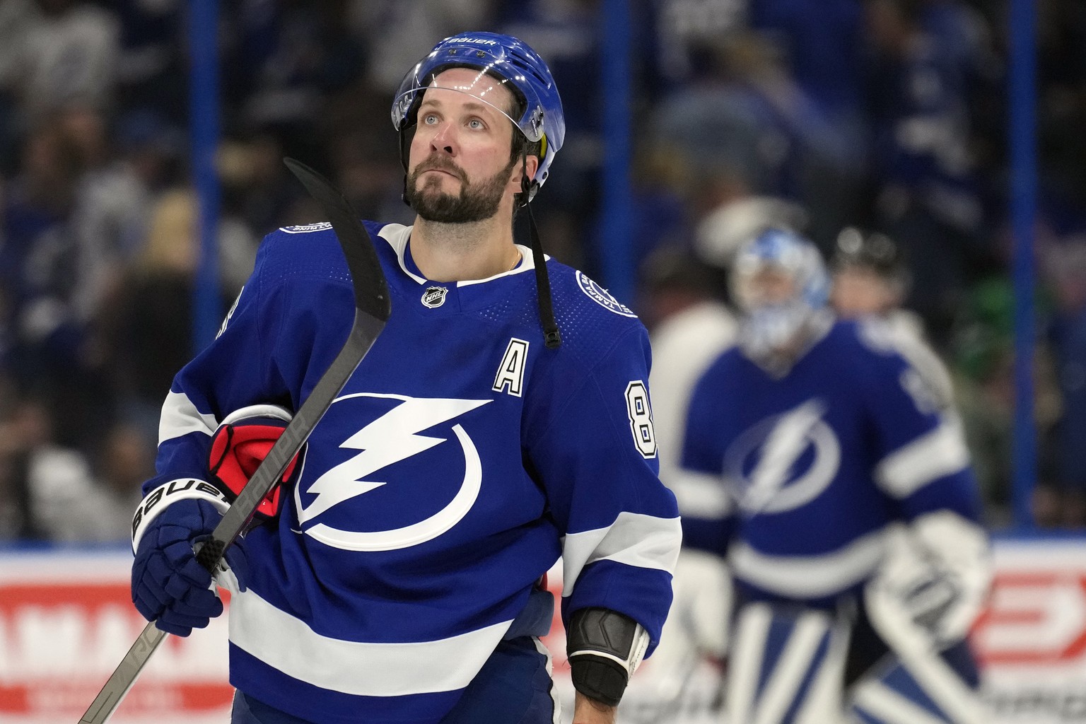 Tampa Bay Lightning right wing Nikita Kucherov (86) reacts after the Toronto Maple Leafs defeated the Lightning in overtime of an NHL hockey game Saturday, Oct. 21, 2023, in Tampa, Fla. (AP Photo/Chri ...