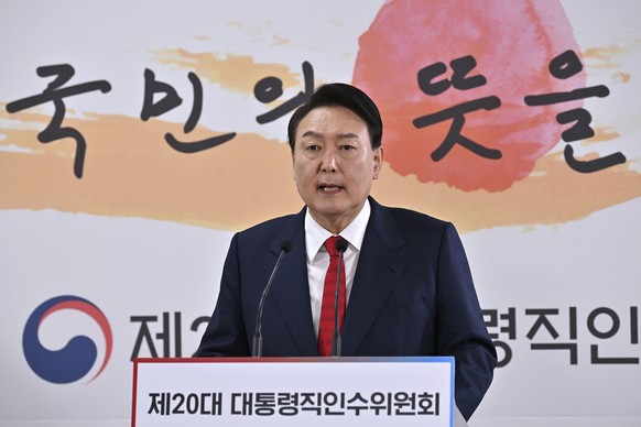 South Korea&#039;s president-elect Yoon Suk Yeol speaks during a news conference to address his relocation plans of the presidential office, in Seoul, South Korea, Sunday, March 20, 2022. (Jung Yeon-j ...