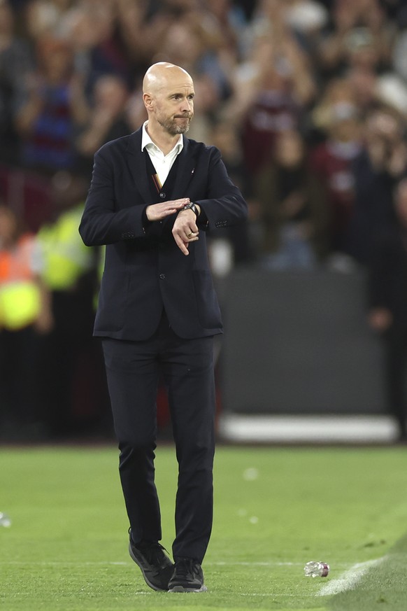 Manchester United&#039;s head coach Erik ten Hag walks in his coaching zone during the English Premier League soccer match between West Ham United and Manchester United at the London Stadium in London ...