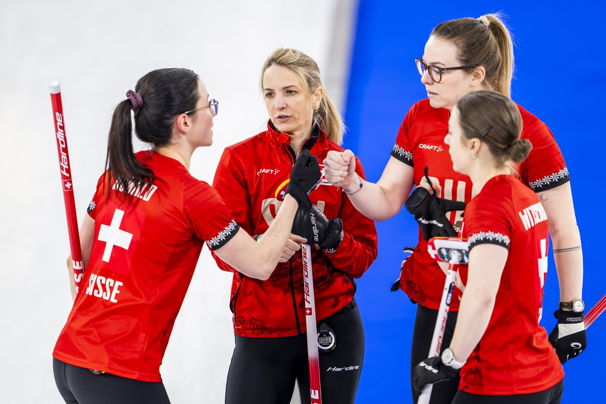 KEYPIX - Carole Howald, Silvana Tirinzoni, Alina Paetz and Selina Witschonke of Switzerland, from left to right, react during the women's curling gold medal game between Switzerland and Sweden at ...