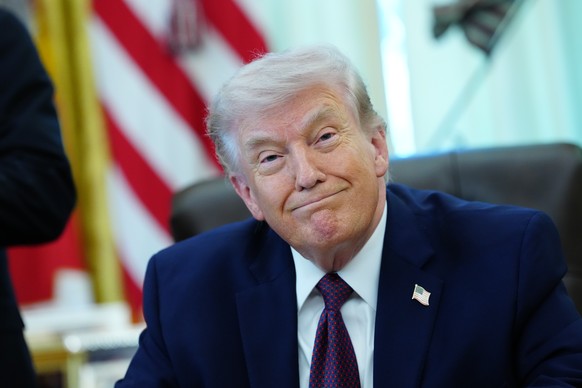 epa12863042 United States President Donald J Trump announces an executive order on election integrity in the Oval Office of the White House in Washington, DC, USA, 31 March 2026. The order directs the ...