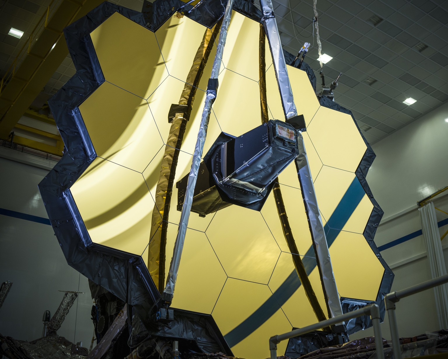 This March 5, 2020 photo made availalble by NASA shows the main mirror assembly of the James Webb Space Telescope during testing at a Northrop Grumman facility in Redondo Beach, Calif. Webb will attem ...