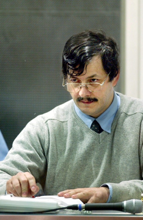 Main accused Marc Dutroux sits in the box at the Arlon assize court, Wednesday, 09 June 2004, during a session of the trial of Marc Dutroux and his accomplices Michelle Martin, Michel Lelievre and Mic ...