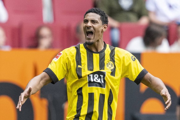 Football: 1st Bundesliga, matchday 33, FC Augsburg - Borussia Dortmund on May 21, 2023 at the WWK Arena in Augsburg.  Dortmund player Sebastien Haller l celebrates after scoring to make it 1-0.  DFL REGULATIONS PROHIBITED…