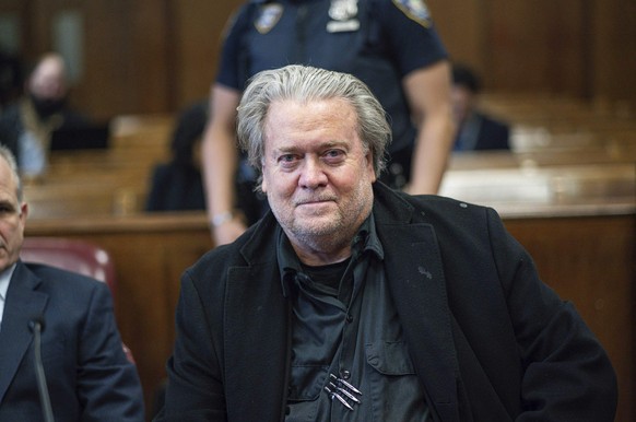 Steve Bannon appears in Manhattan Supreme Court, Tuesday, Feb. 28, 2023 in New York. Bannon is accused of fraud in connection with a charity raising money for a wall on the southern U.S. border. (AP P ...
