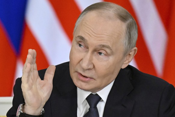 Russian President Vladimir Putin speaks during a joint press statement with Malaysian Prime Minister Anwar Ibrahim at the Kremlin in Moscow, Russia, Wednesday, May 14, 2025. (Alexander Nemenov/Pool Ph ...