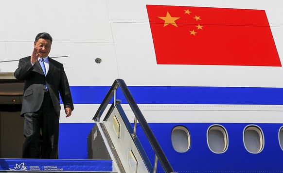 Chinese President Xi Jinping gestures as he arrived at Vladivostok, Russia, to attend the Eastern Economic Forum, Tuesday, Sept. 11, 2018. (Vladimir Smirnov/TASS News Agency Pool Photo via AP)