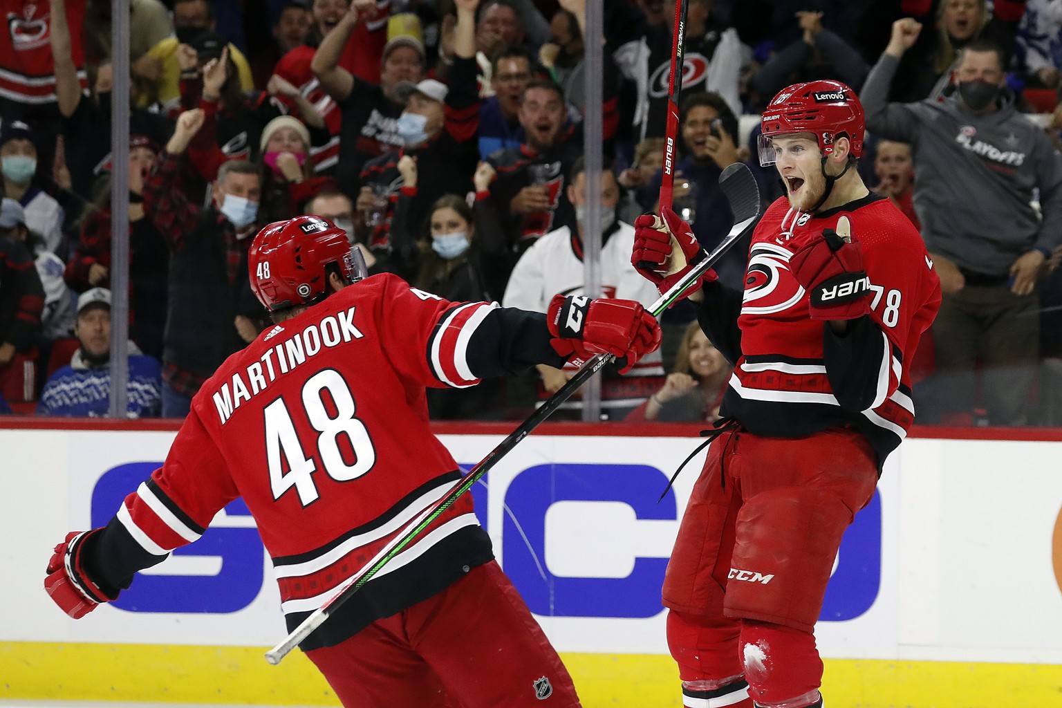 Carolina Hurricanes&#039; Steven Lorentz (78) celebrates his goal with teammate Jordan Martinook (48) during the second period of an NHL hockey game against the Toronto Maple Leafs in Raleigh, N.C., M ...