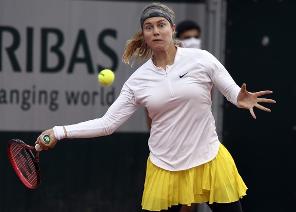 epa08704209 Stefanie Voegele of Switzerland in action against Patricia Maria Tig of Romania during their women?s first round match during the French Open tennis tournament at Roland ?Garros in Paris,  ...