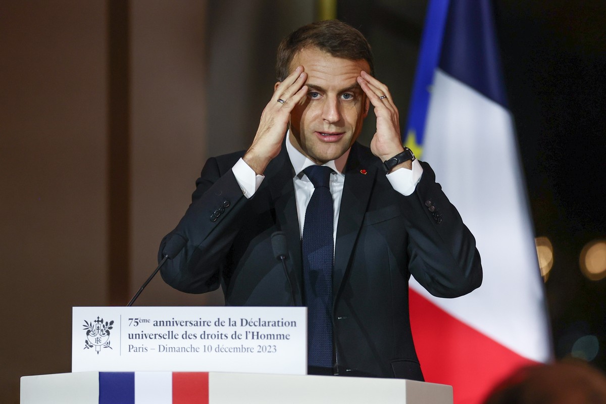epa11021993 French President Emmanuel Macron delivers his speech at the Palais de Chaillot, on the occasion of the 75th anniversary of the Universal Declaration of Human Rights, in Paris, France, 10 D ...